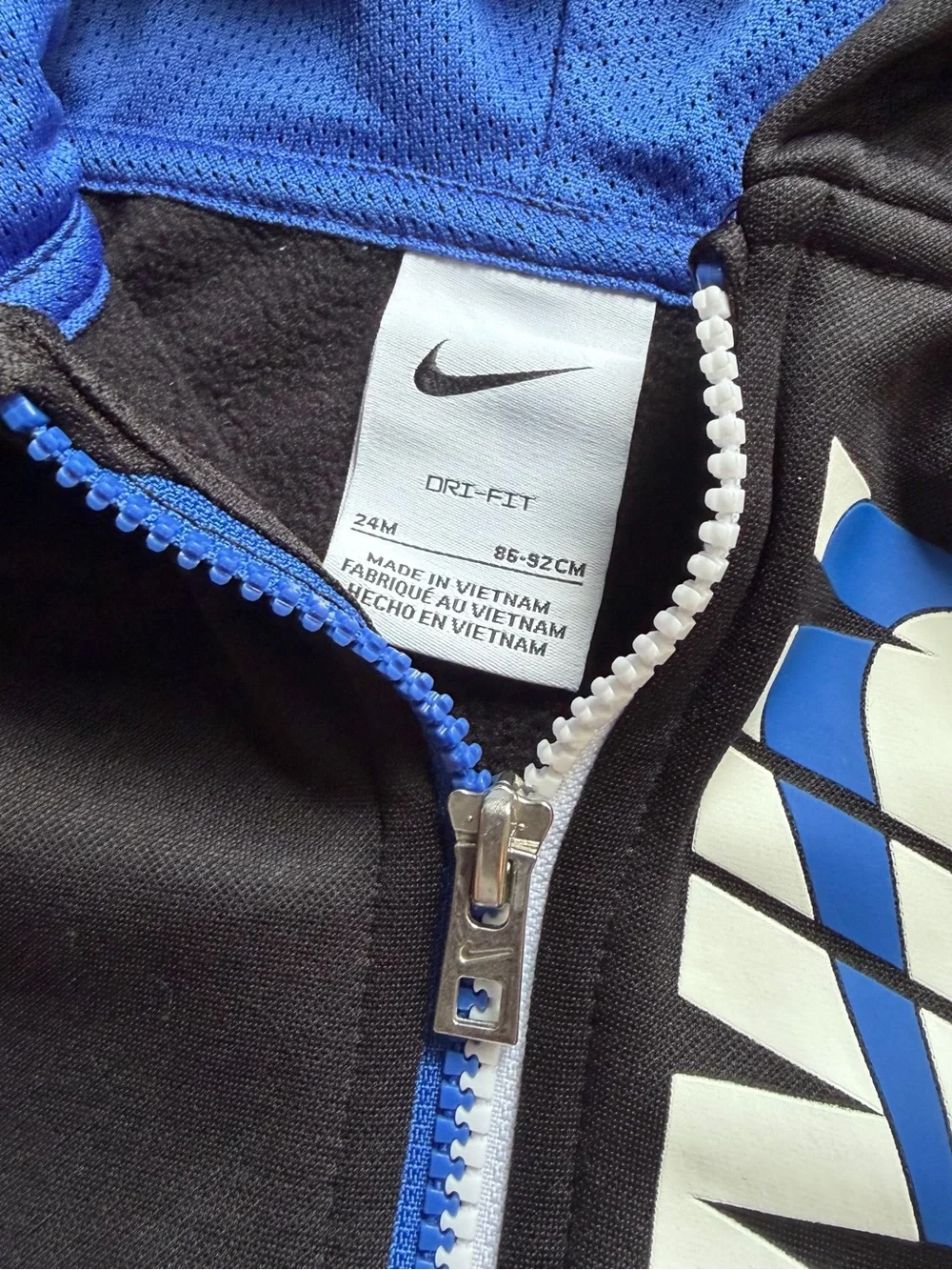 Nike Black Hoodie with Blue Sleeves and White Logo